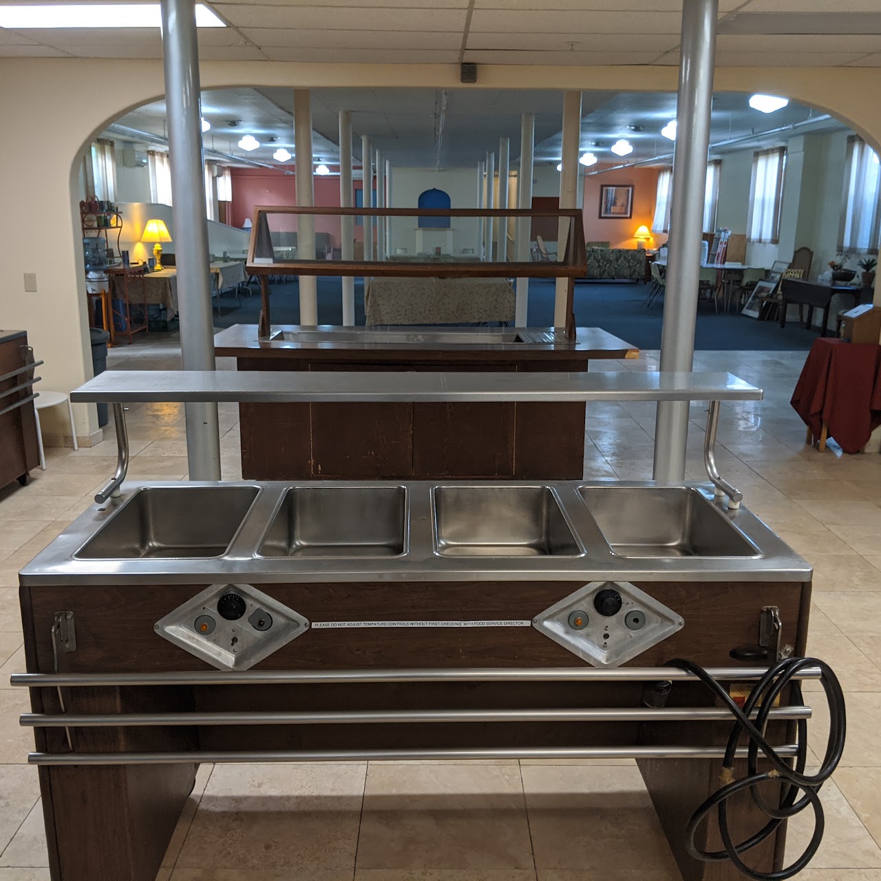 Earlier photograph of the buffet and dining area; not current condition