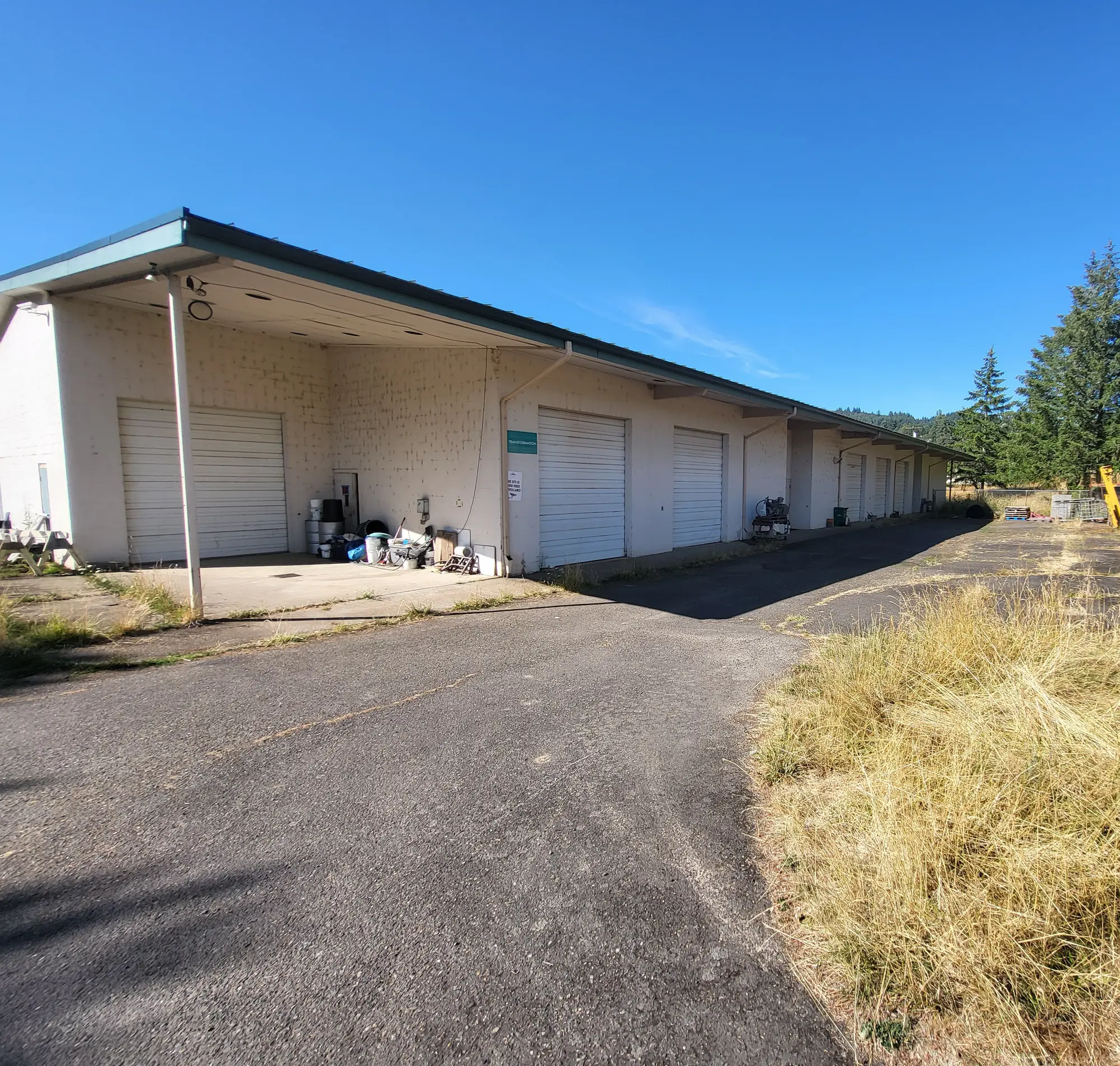 Current exterior and bay doors of the Industrial Arts shop
