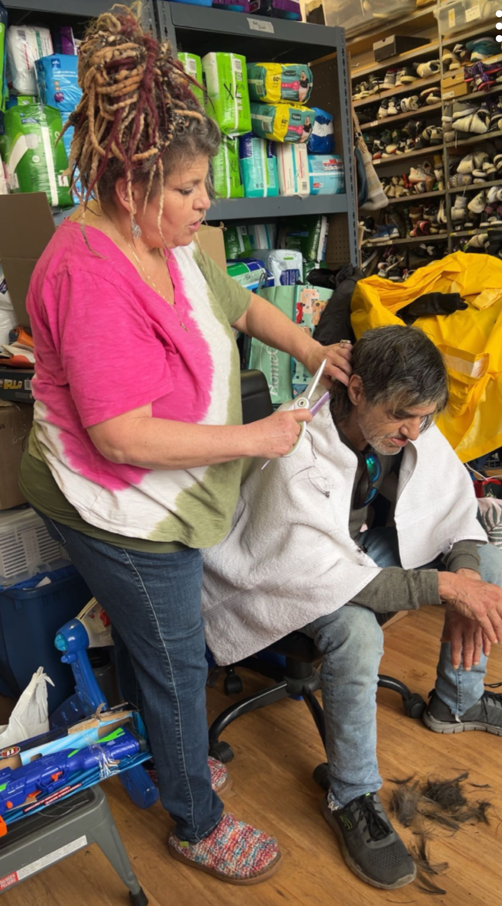 Angel giving a haircut inside GG's House