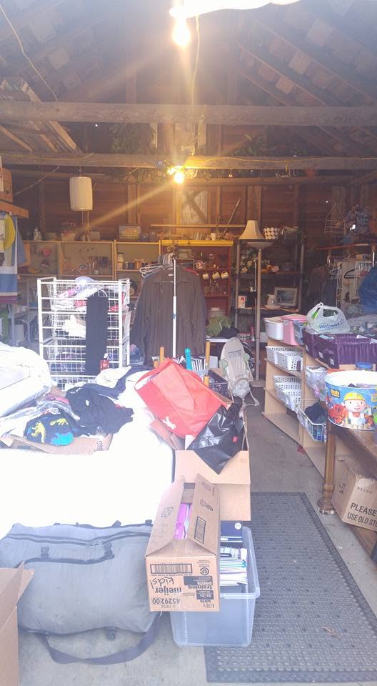 Early garage interior with donated items